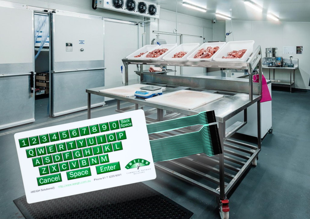 Sealed membrane QWERTY keyboard in a food processing washdown environment