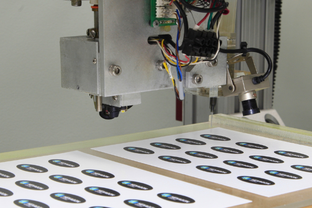 Lensed label - a domed label with a high-gloss clear resin finish