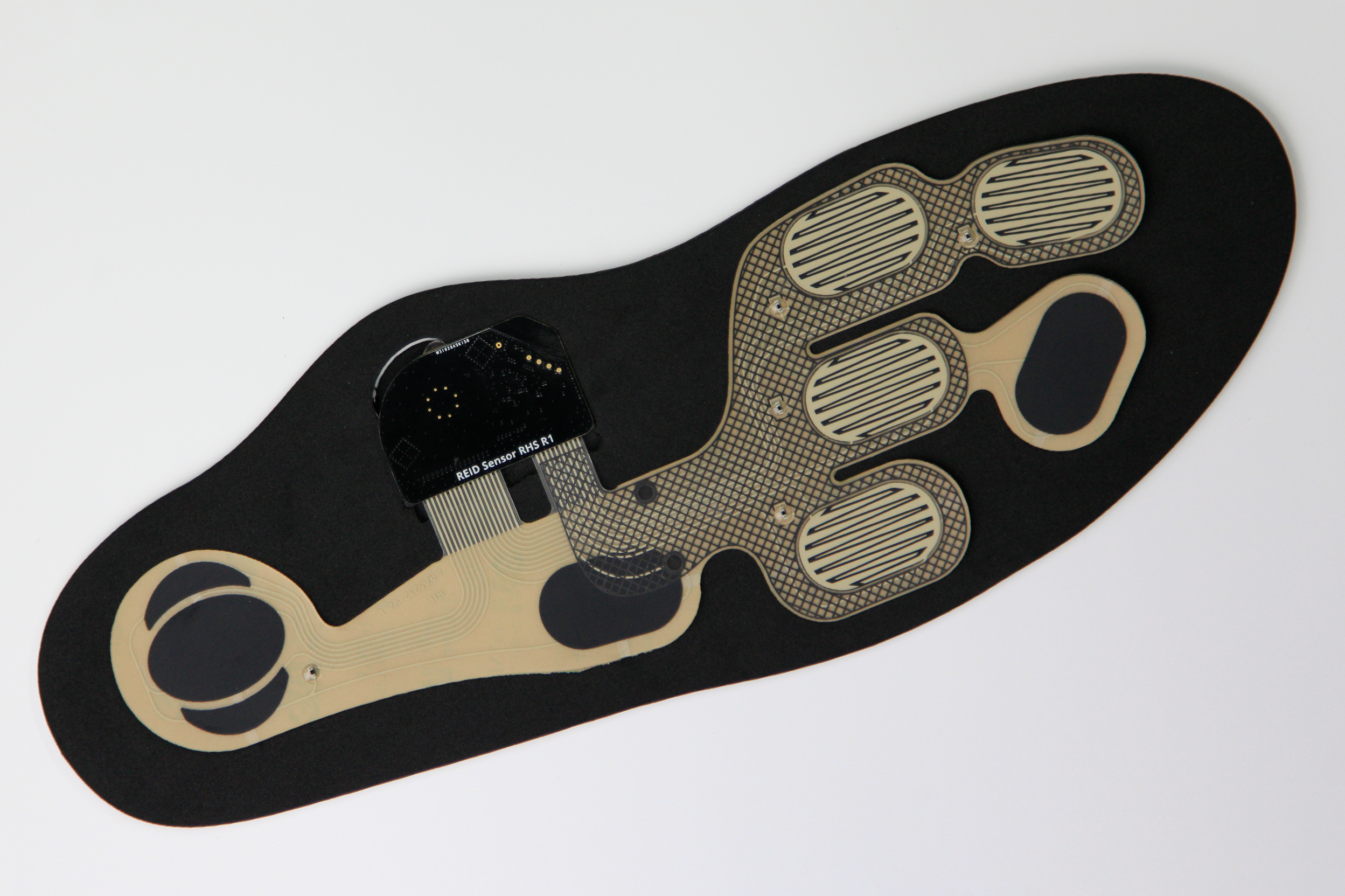 Transparent stretchable printed circuits with serpentine silver traces